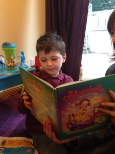 Kian, Starry's friend from the UK, reading his favorite book